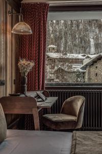 Appart'hotels HOTEL LE VAL D'ISERE : photos des chambres