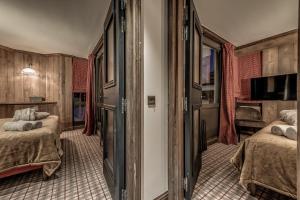 Appart'hotels HOTEL LE VAL D'ISERE : photos des chambres