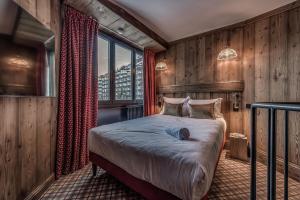 Appart'hotels HOTEL LE VAL D'ISERE : photos des chambres