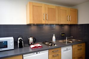 Appartements Appartement Le 510 : photos des chambres