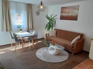 One-Bedroom Apartment (2 Adults + 1 Child) room in Appartements Schusser