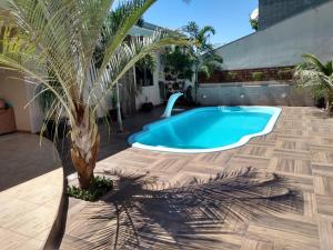 Edicula com um quarto banheiro e piscina e lazer