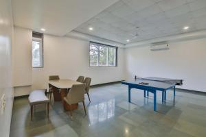 Twilight Grove by StayVista - Pool- view villa with Manicured lawn, Contemporary interiors & Home theatre