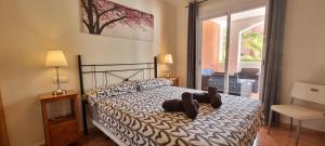 Homes of Spain, Apartamentos Paraíso Vera Playa, Ed Nuku Hiva, Bajo X con PISCINA PRIVADA y jardín privado a PIE de PLAYA , WIFI