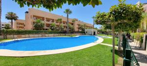Apartamentos Paraíso Vera Playa, Ed Nuku Hiva, Bajo X con PISCINA PRIVADA y jardín privado a PIE de PLAYA , WIFI