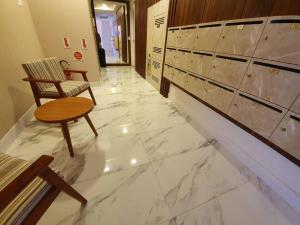 Apto na praia de Palmas, próximo ao mar, climatizado e com piscina