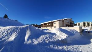 Appartements Au Coeur de Premanon : photos des chambres