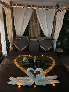 Maisons de vacances Magnifique love room avec jacuzzi privatif vue Mer : photos des chambres