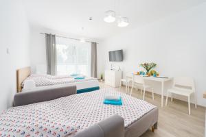 Apartamenty Nadmorska 104 Sunset Resort - 3hvězdičkové hotely ve městě Grzybowo