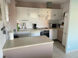 Appartements Villa Louise - Appartement Spacieux proche digue avec jardin : photos des chambres