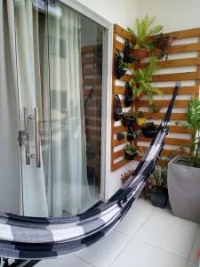 APARTAMENTO COM SUITE EM CONDOMÍNIO FECHADO com estacionamento próprio - José Ribeiro