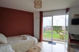 Appartements Jardin - a 50m de la plage - Wifi - Parking : photos des chambres