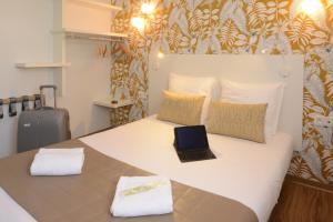 Hotels Hotel Arc-En-Ciel Colmar Contact Hotel : photos des chambres