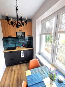 APARTAMENT NA WZGÓRZU