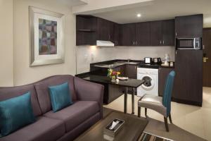 Executive Studio room in Savoy Central Hotel Apartments