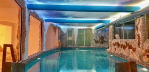 Deluxe Quadruple Room room in Bali Colosseum Hotel