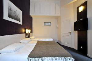 Hotels Brit Hotel Lyon Nord Dardilly : Chambre Quadruple Supérieure