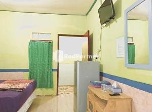 Hotel Indah Grogot Syariah Mitra RedDoorz