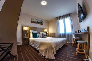 Hotels Logis Hotel du Parc : photos des chambres