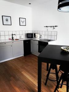 Appartements Suite 24 Appart'hotel-3 etoiles : photos des chambres
