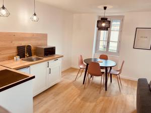 Appartements Suite 24 L'Annexe : photos des chambres