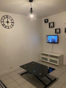 Appartements F2 limitrophe a la ville d’Enghien les bains : photos des chambres