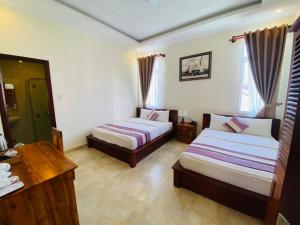 Phòng 4 Người (Quadruple Room)