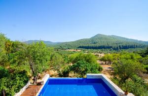 Stone clad Villa La Maison P