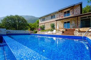 Stone clad Villa La Maison P