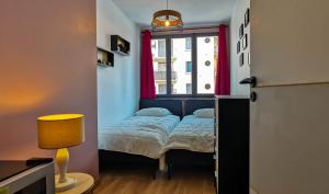 Appartements LE COQUET - Gare - Hyper centre - Parking - Wifi - Netflix - Disney+ : photos des chambres