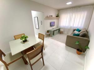 Apartamento no centro, ar-condicionado e garagem