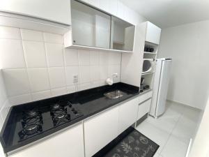 Apartamento no centro, ar-condicionado e garagem