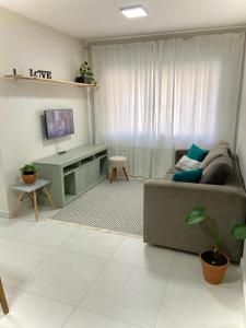 Apartamento no centro, ar-condicionado e garagem