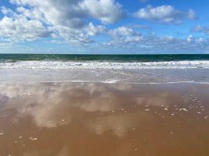 Descanso com pé na areia!