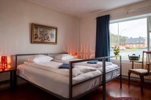 Double or Twin Room with Shared Bathroom room in Sjávarborg