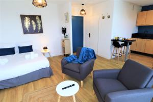 Appartements L'ECRIN Logement tout confort wifi, centre-ville, parking prive : photos des chambres