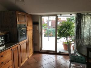 Appartamento con terrazza e posto auto Libri e Giardini