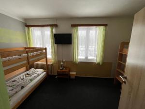 Quadruple Room with Shared Bathroom room in Hostel Kořenov