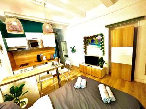 Appartements *Tropical*Hyper centre *Fibre Wifi*Studio : photos des chambres