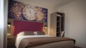 Hotels L'Horloge Gourmande : photos des chambres