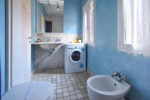 Welc-ōM Battisti Heights