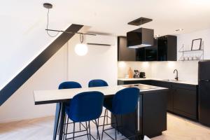 Appartements Le Splendide de Poincare : photos des chambres