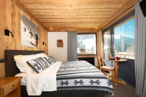 Hotels Hotel-Chalet Les Ecureuils Jardin, Piscine, Sauna : photos des chambres