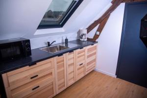 Appartements L'Atelier Brainois - Meuble de tourisme 3*** : photos des chambres