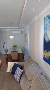 Meia Praia Apto Fino Acabamento 3 suítes e 2 garagens