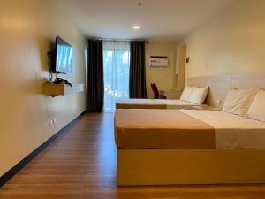 Olive Town Center and Hotel