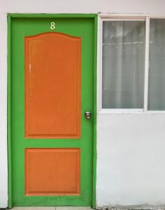 Room with 1 double bed and 2 single beds