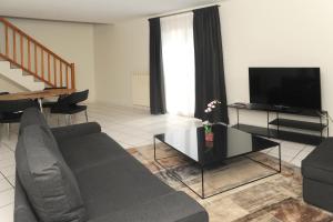 Appartements A la Suite du Jardin de l'Isle : photos des chambres