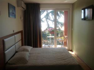 Two-Bedroom Suite with Balcony and Sea View room in Elizabeth Dy Boutique Hotel