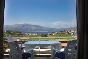 Apartment in Lumbarda with sea view, balcony, air conditioning, WiFi 4432-3